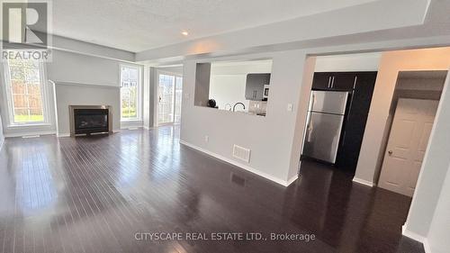 133 Braddock Private, Ottawa, ON - Indoor Photo Showing Living Room With Fireplace