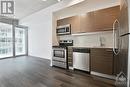 EAT-IN KITCHEN | stainless appliances, granite, efficient work & storage space - 354 Gladstone Avenue Unit#502, Ottawa, ON  - Indoor Photo Showing Kitchen 