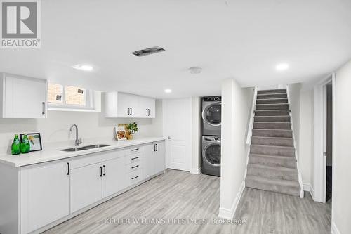 100 Lincoln Place, London, ON - Indoor Photo Showing Laundry Room