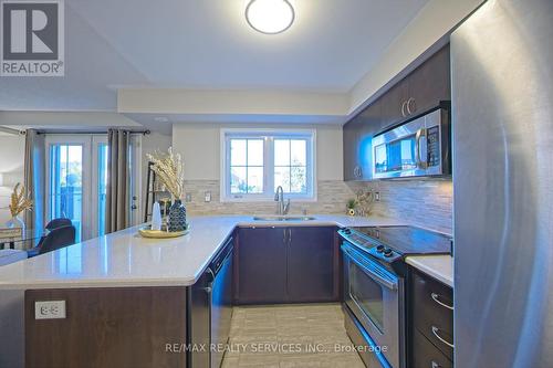 4 - 2563 Sixth Line, Oakville, ON - Indoor Photo Showing Kitchen With Double Sink With Upgraded Kitchen