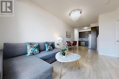 707 - 9560 Markham Road, Markham (Wismer), ON - Indoor Photo Showing Living Room