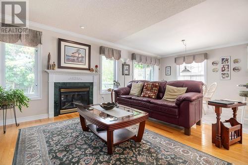 34 Loyalist Court, Barrie, ON - Indoor Photo Showing Living Room With Fireplace