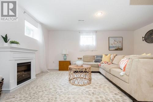 84 Silver Birch Avenue, Wasaga Beach, ON - Indoor Photo Showing Living Room With Fireplace