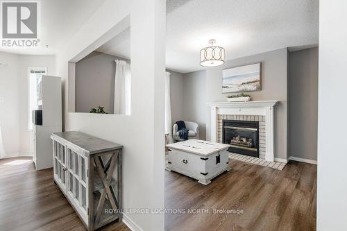 84 Silver Birch Avenue, Wasaga Beach, ON - Indoor Photo Showing Other Room With Fireplace