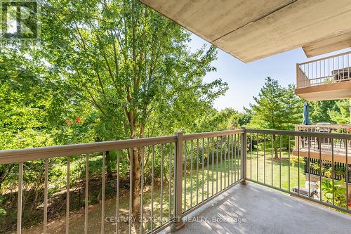 209 - 1470 Bishops Gate, Oakville (Glen Abbey), ON - Outdoor With Balcony With Exterior