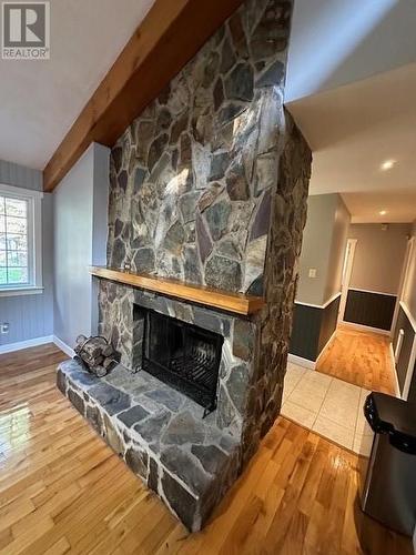 2 Rocky Lane, Bristols Hope, NL - Indoor Photo Showing Living Room With Fireplace