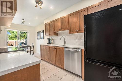 New Birch refaced cabinetry - 2029 Breezewood Street, Ottawa, ON - Indoor Photo Showing Kitchen