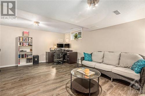 Family room in Lower Level - 2029 Breezewood Street, Ottawa, ON - Indoor Photo Showing Living Room