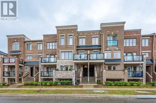 114 - 100 Parrotta Drive, Toronto, ON - Outdoor With Facade