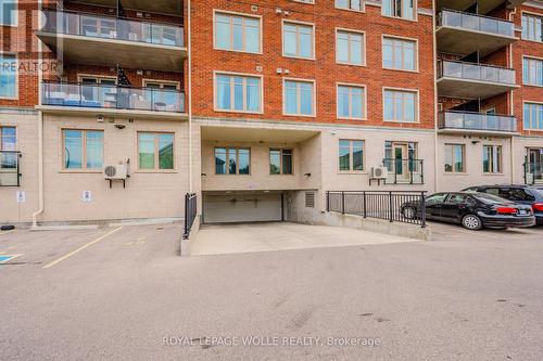 301 - 175 Commonwealth Street, Kitchener, ON - Outdoor With Balcony With Facade