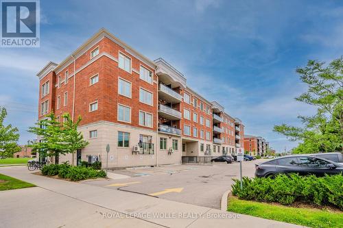 301 - 175 Commonwealth Street, Kitchener, ON - Outdoor With Balcony With Facade