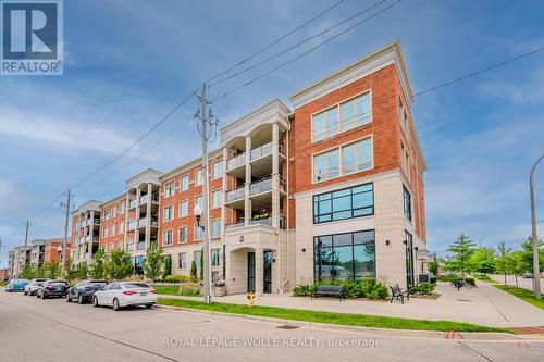 301 - 175 Commonwealth Street, Kitchener, ON - Outdoor With Balcony With Facade