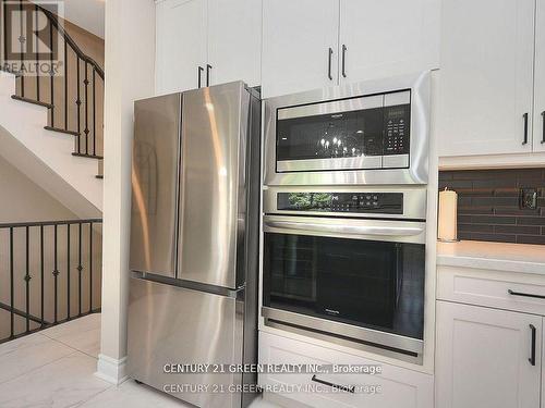 2 - 3350 Thomas Street, Mississauga (Churchill Meadows), ON - Indoor Photo Showing Kitchen With Stainless Steel Kitchen