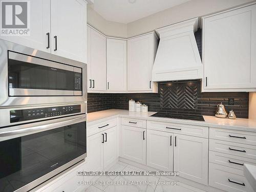 2 - 3350 Thomas Street, Mississauga (Churchill Meadows), ON - Indoor Photo Showing Kitchen