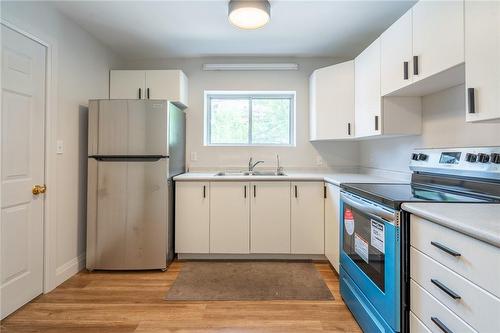 Unit 1 Kitchen - 82 Ray Street S, Hamilton, ON - Indoor Photo Showing Kitchen With Double Sink