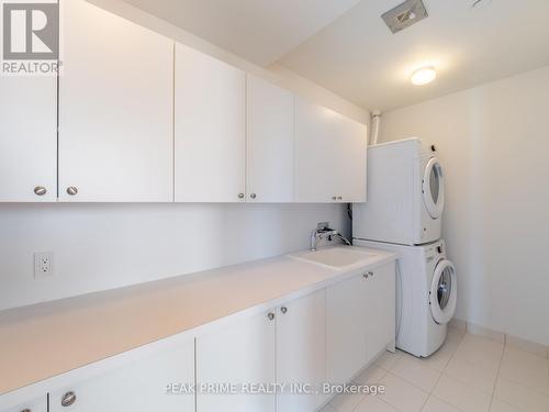 Ph22 - 55 Merchants' Wharf, Toronto (Waterfront Communities), ON - Indoor Photo Showing Laundry Room