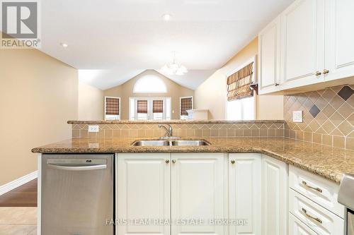 51 Tuscany Grande, New Tecumseth (Alliston), ON - Indoor Photo Showing Kitchen With Double Sink