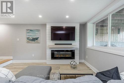 157 Woodland Drive, Wasaga Beach, ON - Indoor Photo Showing Living Room With Fireplace