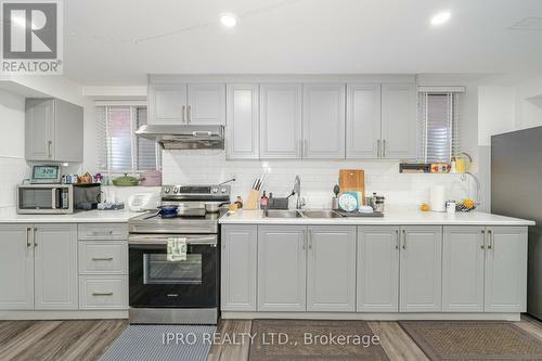 335 Bessborough Drive, Milton (Harrison), ON - Indoor Photo Showing Kitchen With Double Sink