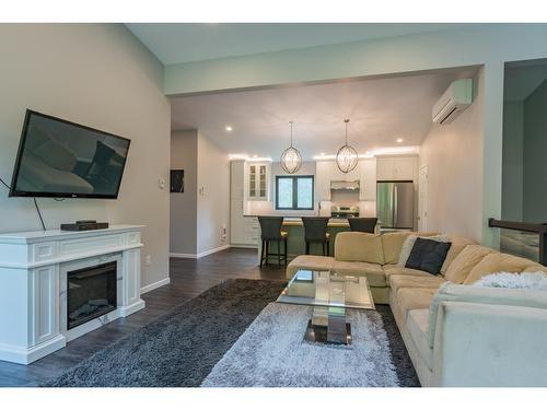 1959 Sandy Road, Castlegar, BC - Indoor Photo Showing Living Room With Fireplace