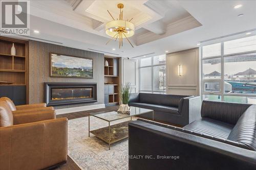 1001 - 450 Dundas Street E, Hamilton, ON - Indoor Photo Showing Living Room With Fireplace