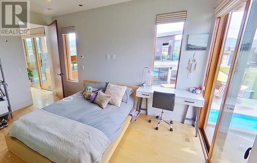 Bedroom 1 upper level main house with its own private deck and ensuite - 3194 Dunster Road, Kelowna, BC 