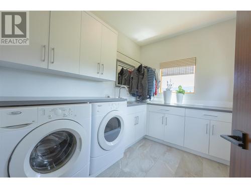 laundry room in suite. - 3194 Dunster Road, Kelowna, BC 