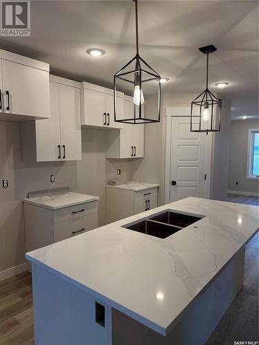 421 Eldorado Street, Warman, SK - Indoor Photo Showing Kitchen With Double Sink