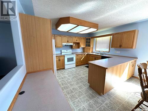 604 Donald Street, Hudson Bay, SK - Indoor Photo Showing Kitchen With Double Sink