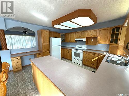 604 Donald Street, Hudson Bay, SK - Indoor Photo Showing Kitchen With Double Sink