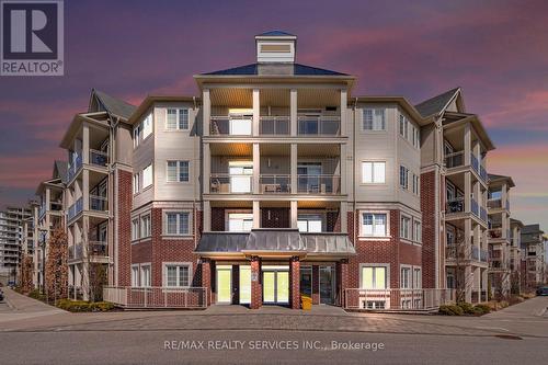 #204 - 84 Aspen Springs Drive, Clarington (Bowmanville), ON - Outdoor With Balcony With Facade