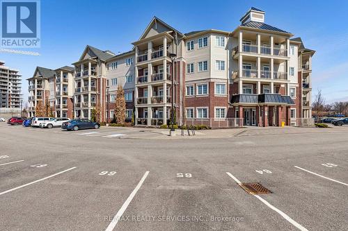 #204 - 84 Aspen Springs Drive, Clarington (Bowmanville), ON - Outdoor With Balcony With Facade