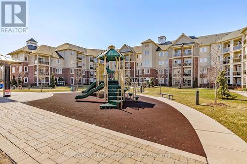 #204 - 84 Aspen Springs Drive, Clarington (Bowmanville), ON - Outdoor With Balcony With Facade