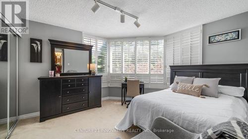 212 - 168 Bonis Avenue, Toronto (Tam O'Shanter-Sullivan), ON - Indoor Photo Showing Bedroom