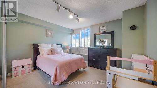 212 - 168 Bonis Avenue, Toronto (Tam O'Shanter-Sullivan), ON - Indoor Photo Showing Bedroom