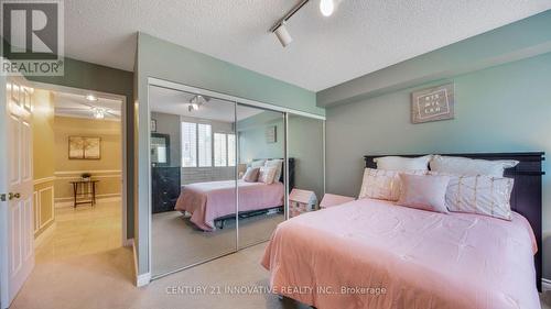 212 - 168 Bonis Avenue, Toronto (Tam O'Shanter-Sullivan), ON - Indoor Photo Showing Bedroom