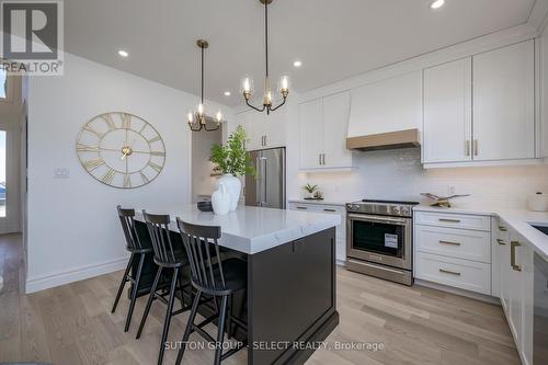 8 Hazelwood Path, Thames Centre (Dorchester), ON - Indoor Photo Showing Kitchen With Upgraded Kitchen