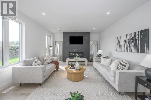 118 Timberwalk Trail, Middlesex Centre (Ilderton), ON - Indoor Photo Showing Living Room With Fireplace