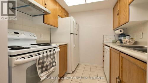 424 - 8351 Mclaughlin Road, Brampton (Brampton South), ON - Indoor Photo Showing Kitchen With Double Sink