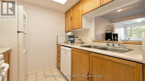 424 - 8351 Mclaughlin Road, Brampton, ON - Indoor Photo Showing Kitchen With Double Sink