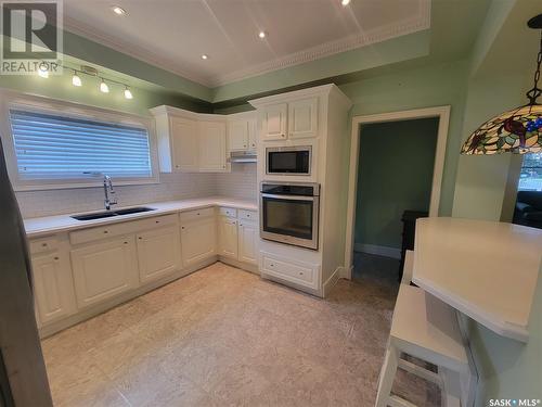 300 Main Street, Wilkie, SK - Indoor Photo Showing Kitchen With Double Sink