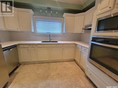 300 Main Street, Wilkie, SK - Indoor Photo Showing Kitchen With Double Sink