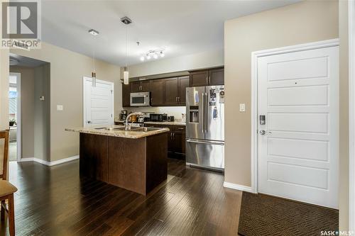 212 4501 Child Avenue, Regina, SK - Indoor Photo Showing Kitchen With Stainless Steel Kitchen