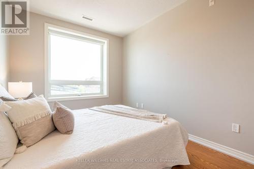 208 - 33 Whitmer Street, Milton (Scott), ON - Indoor Photo Showing Bedroom