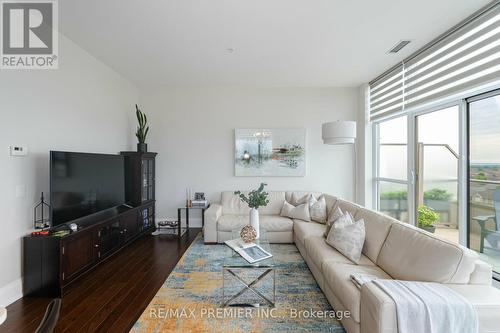 710 - 2480 Prince Michael Drive, Oakville, ON - Indoor Photo Showing Living Room