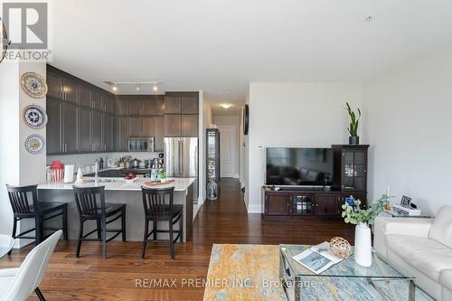 710 - 2480 Prince Michael Drive, Oakville, ON - Indoor Photo Showing Living Room