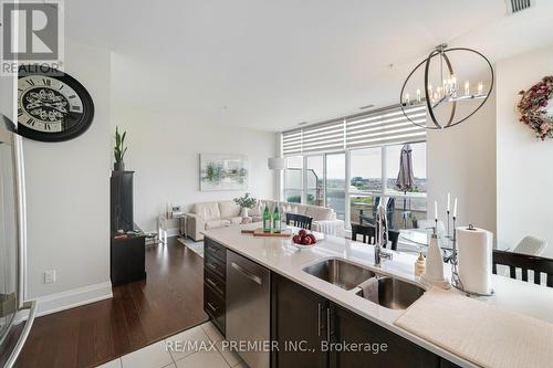 710 - 2480 Prince Michael Drive, Oakville, ON - Indoor Photo Showing Kitchen With Double Sink