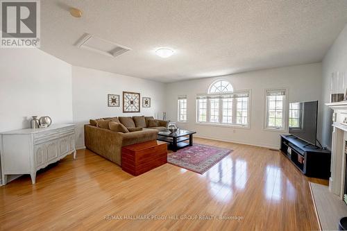 19 Serena Lane, Barrie (Painswick South), ON - Indoor Photo Showing Living Room With Fireplace