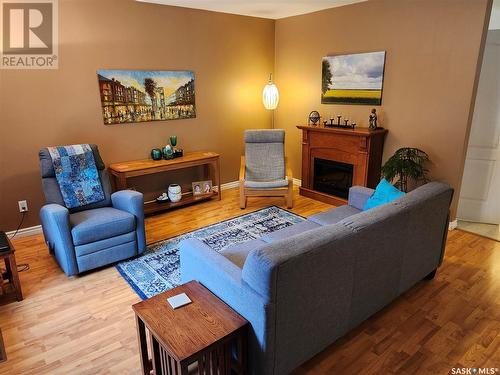 129 L Avenue S, Saskatoon, SK - Indoor Photo Showing Living Room With Fireplace