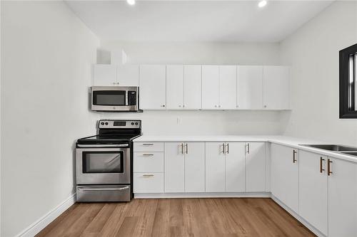 MAIN LEVEL - 68 Kinrade Avenue, Hamilton, ON - Indoor Photo Showing Kitchen